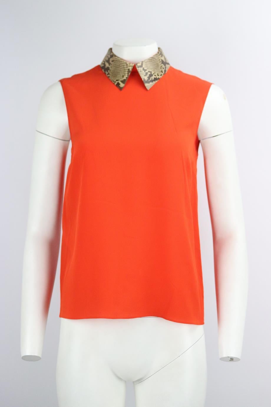 Gucci python trimmed silk top. Orange. Sleeveless, crewneck. Zip fastening at back. 100% Silk; fabric2: 100% python. Size: IT 42 (UK 10, US 6, FR 38). Bust: 37 in. Waist: 37 in. Hips: 38 in. Length: 24 in. Very good condition - No sign of wear; see
