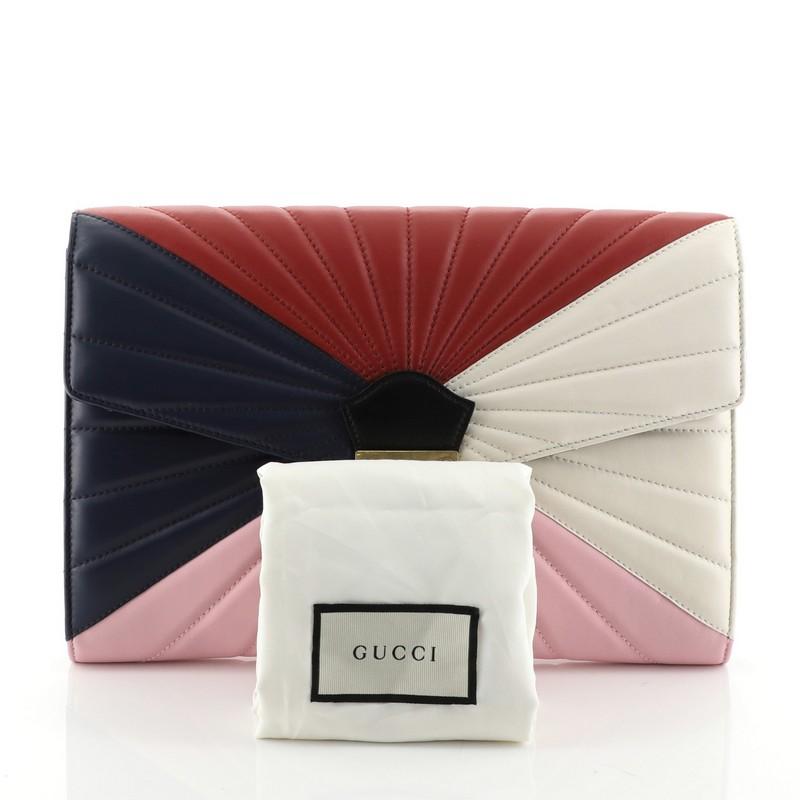 This Gucci Queen Margaret Clutch Colorblock Leather, crafted in multicolor leather, features a quilted heart at the back and a bejeweled bee, and aged gold-tone hardware. Its push-lock closure opens to a neutral microfiber interior with zip and slip