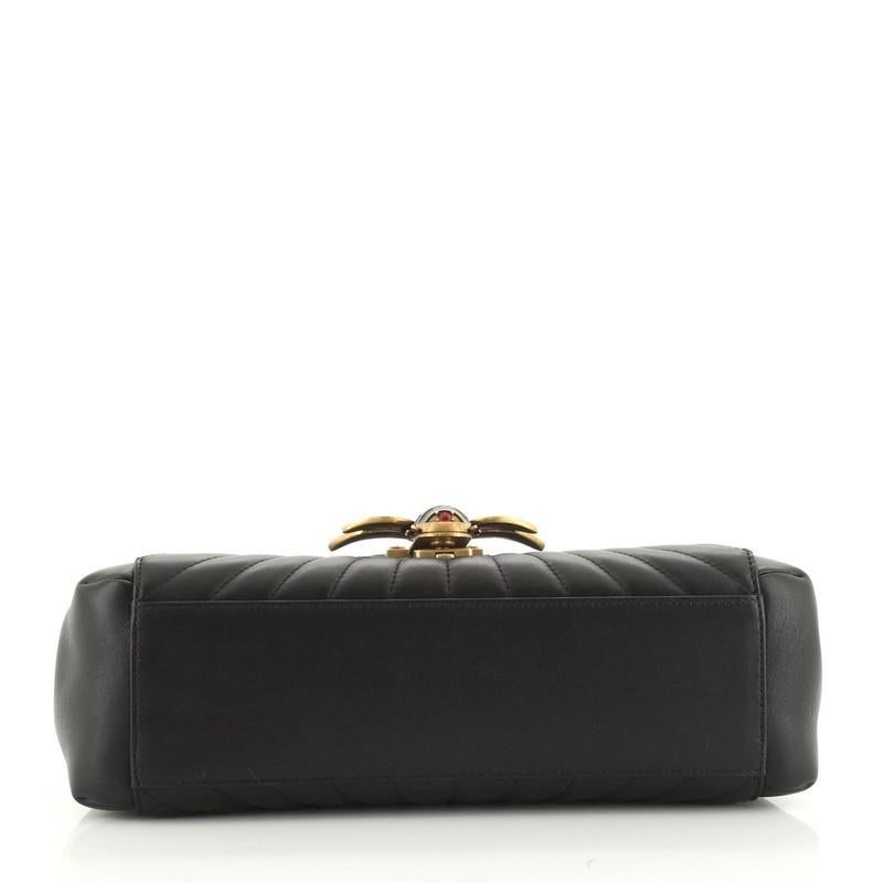 queen elizabeth gucci bag