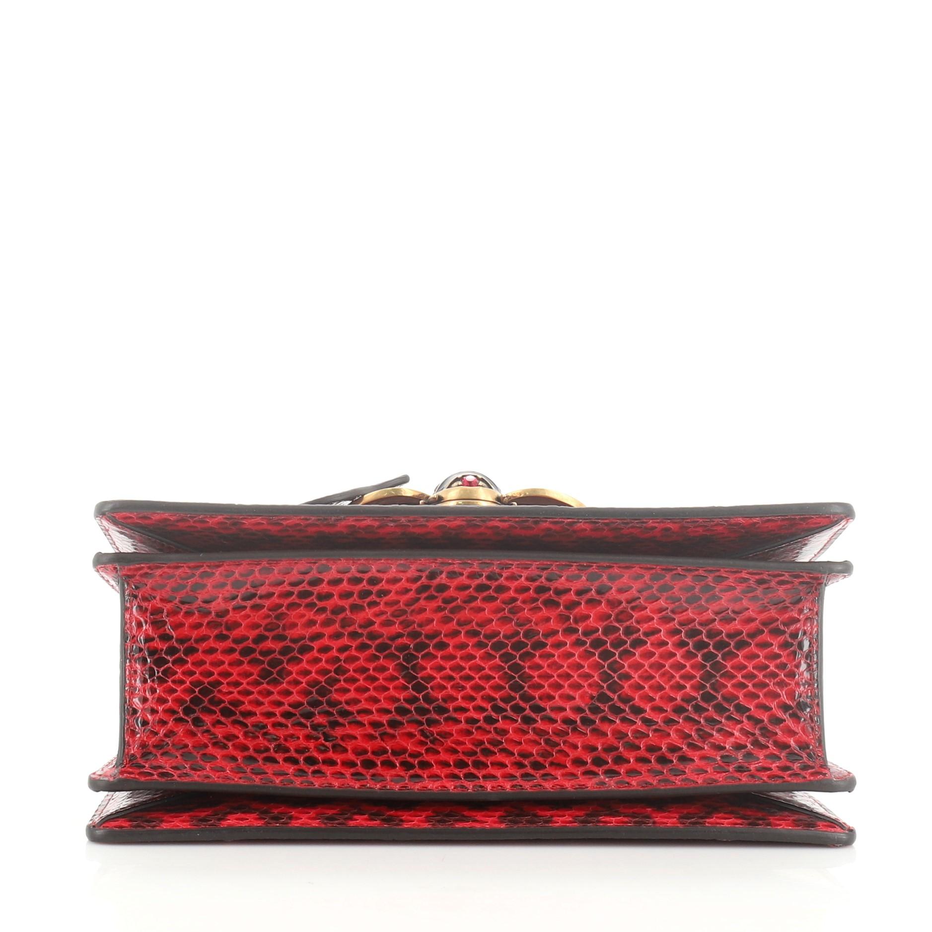 red snakeskin bag