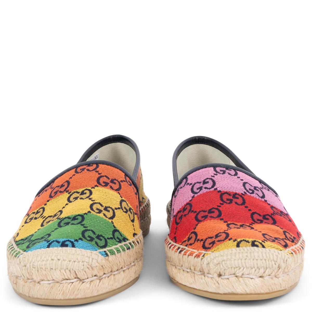 100% authentic Gucci Pilar slip on espadrilles in rainbow colored GG Supreme eco-washed organic jacquard denim. Black leather trim at topline and sides. Braided jute detail at sole edge with rubber sole.  Brand new. Come with dust bag.