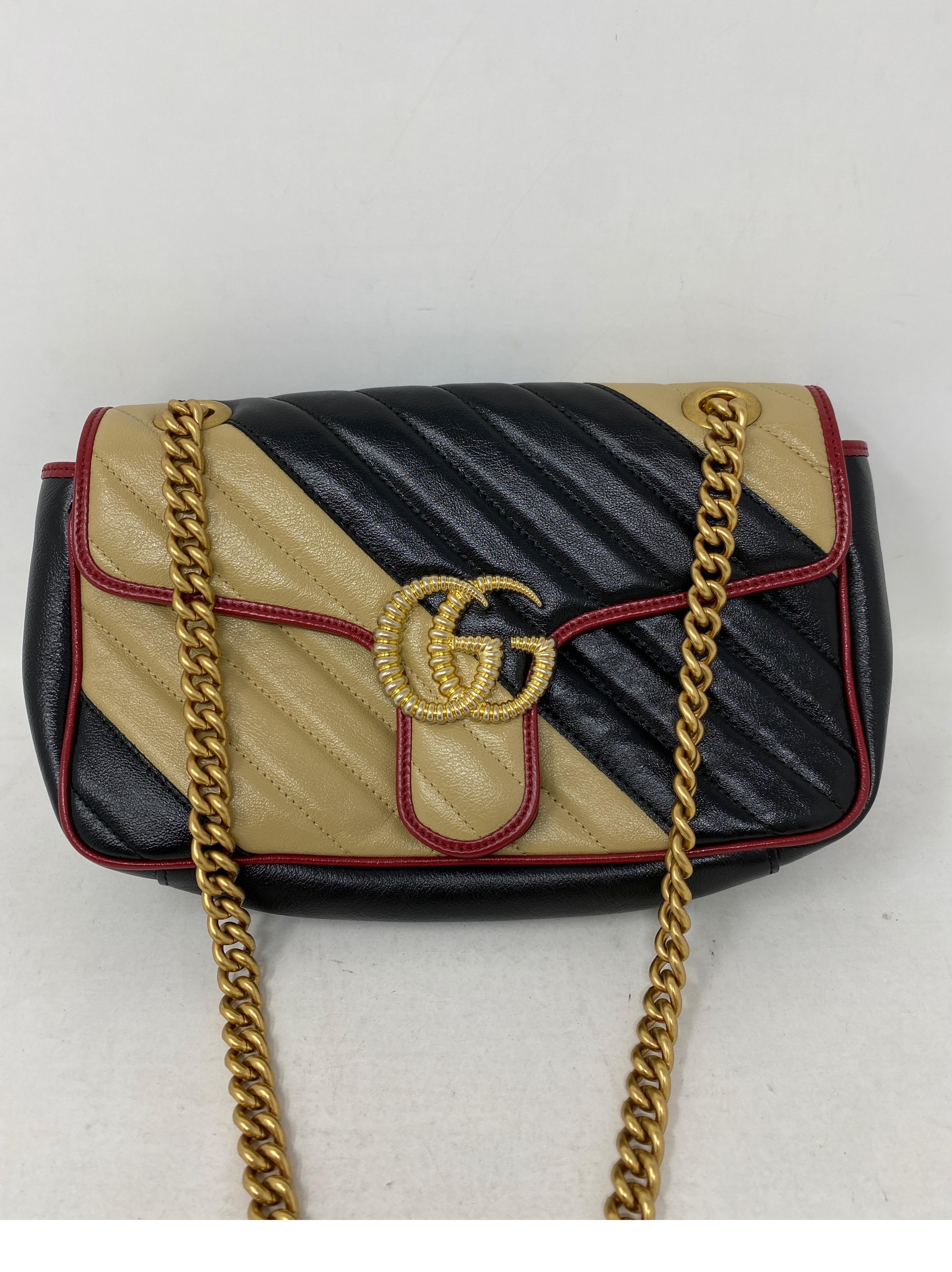 Gucci Red and Black Marmont Bag. Beautiful Gucci bag in excellent condition. Can be worn as a crossbody or doubled as a shoulder bag. Guaranteed authentic. 