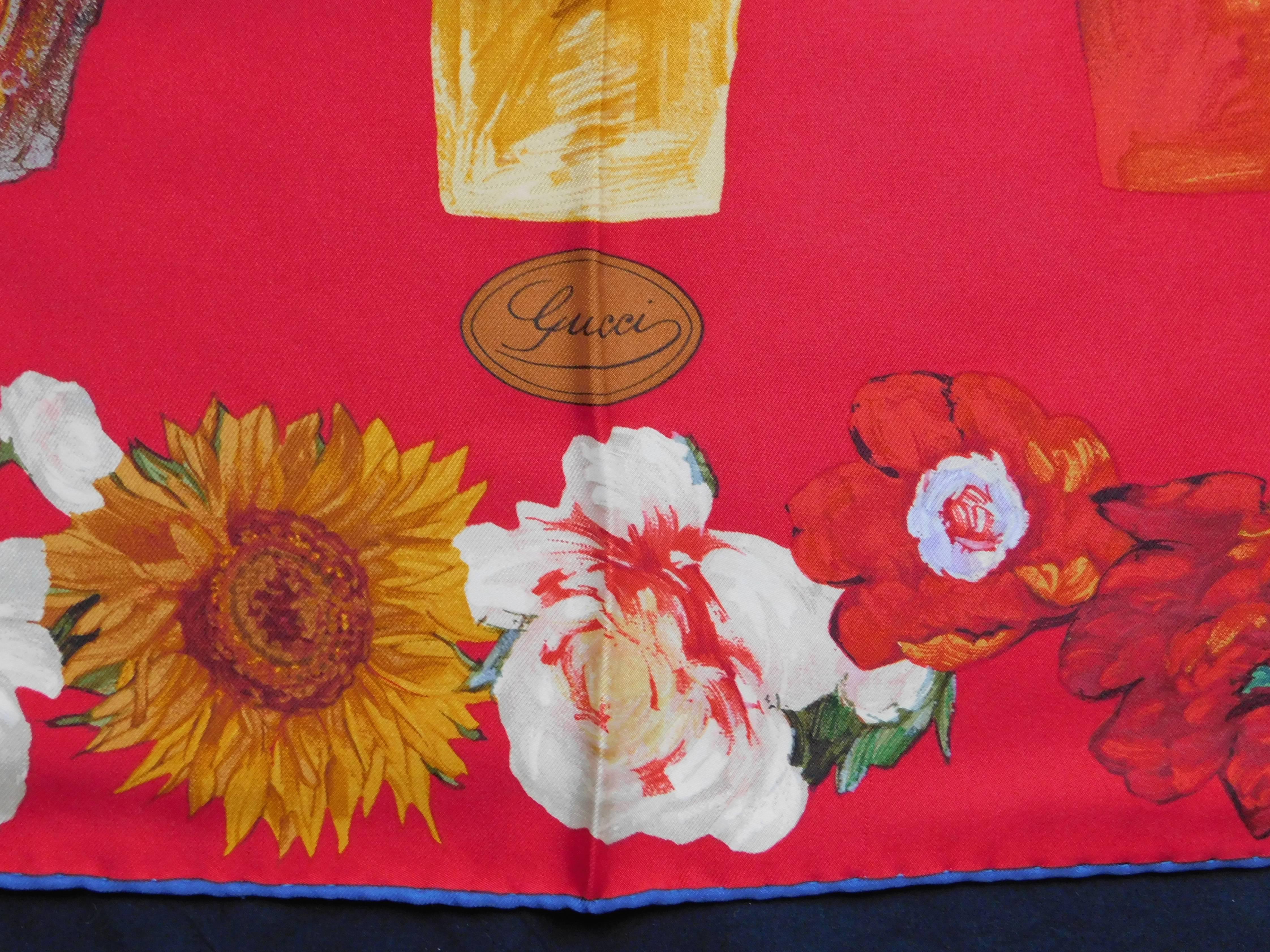 A vivid design of painted flower pots and Van Gogh-esque sunflowers on the perfect deep lipstick red background finished with a hand rolled and sewn blue edge.
The twill silk has a rich hand and drapes beautifully.
