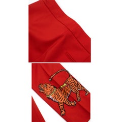 gucci red ankle crop embroidered tiger trousers