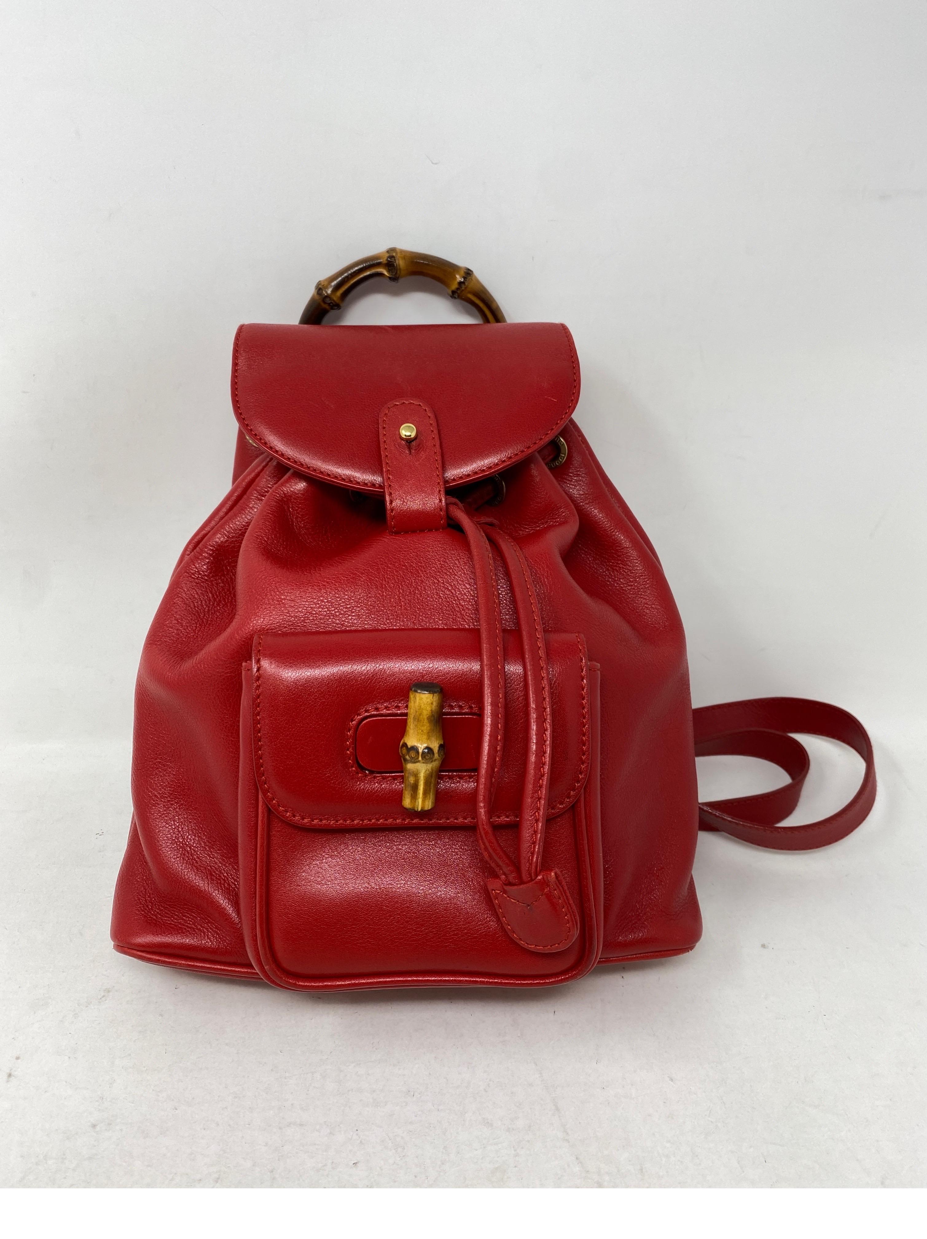 Gucci Red Leather Backpack. Bamboo closure and handle. Red leather small backpack. Excellent condition. Clean interior. Guaranteed authentic. 