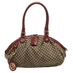 Gucci - Sac Boston « Sukey » en toile et cuir rouge/beige diamanté, taille moyenne