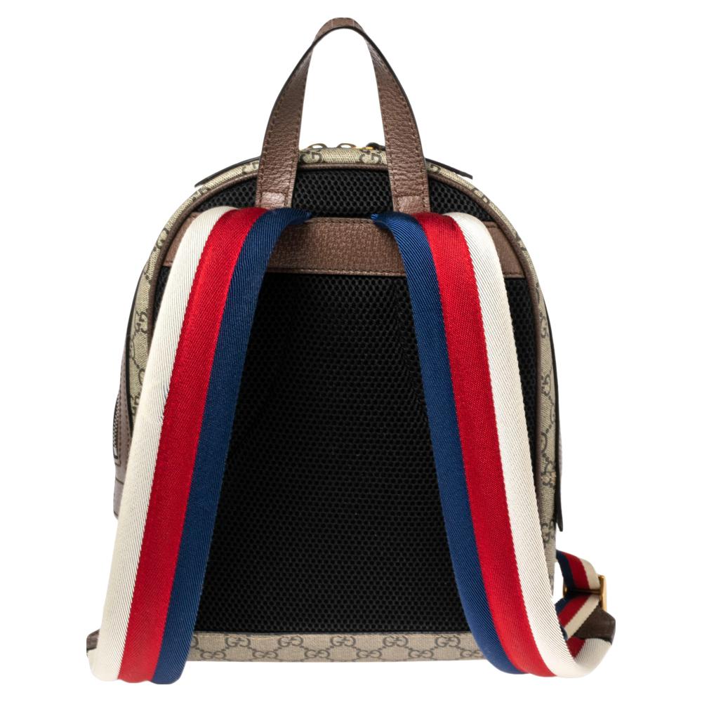 Add some magic to your everyday attire with this super stylish Bosco backpack. The bag by Gucci is made from GG-coated canvas and enhanced with leather trims. The backpack is held by two web-detailed shoulder straps and a top handle and is equipped