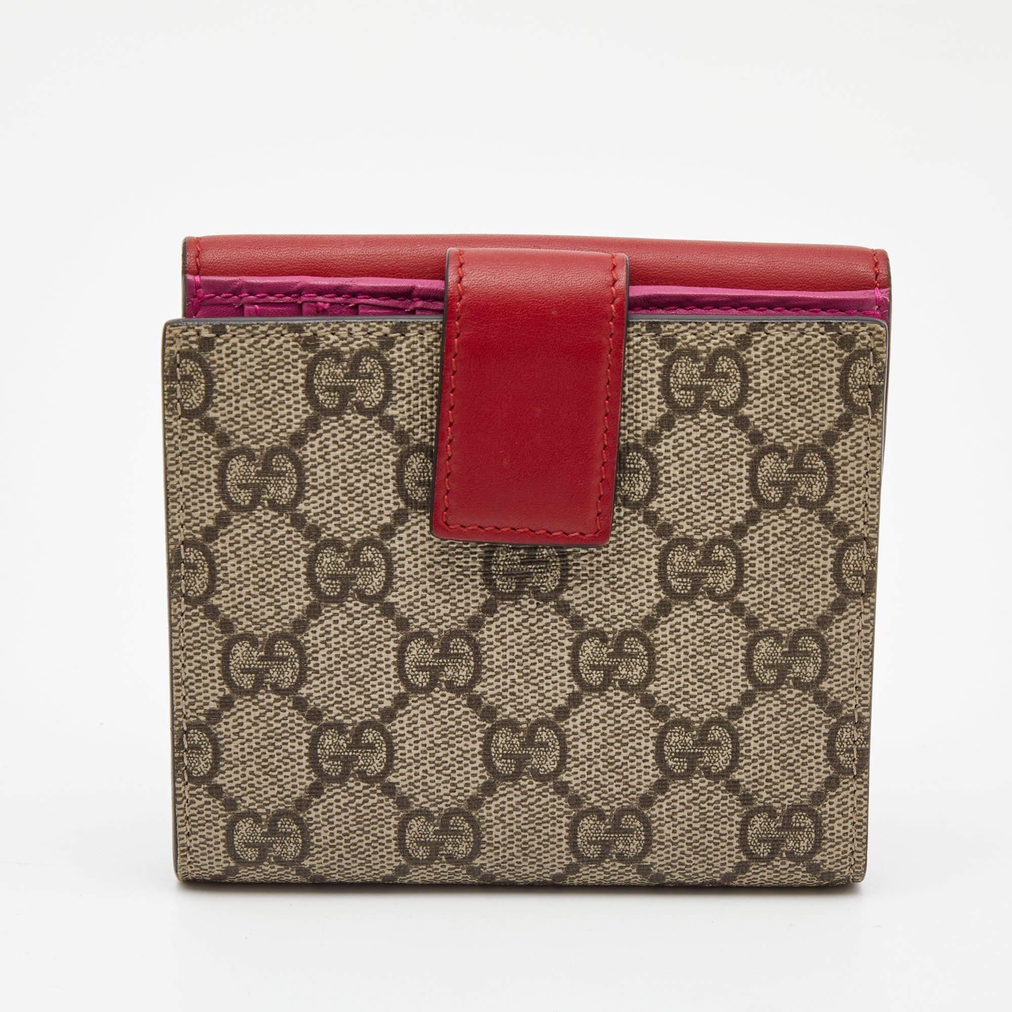 Now here's a wallet that is both stylish and functional. This French wallet by Gucci has been crafted from GG Supreme coated canvas and detailed with leather trims. It opens to reveal multiple slots and compartments to neatly arrange your cards and