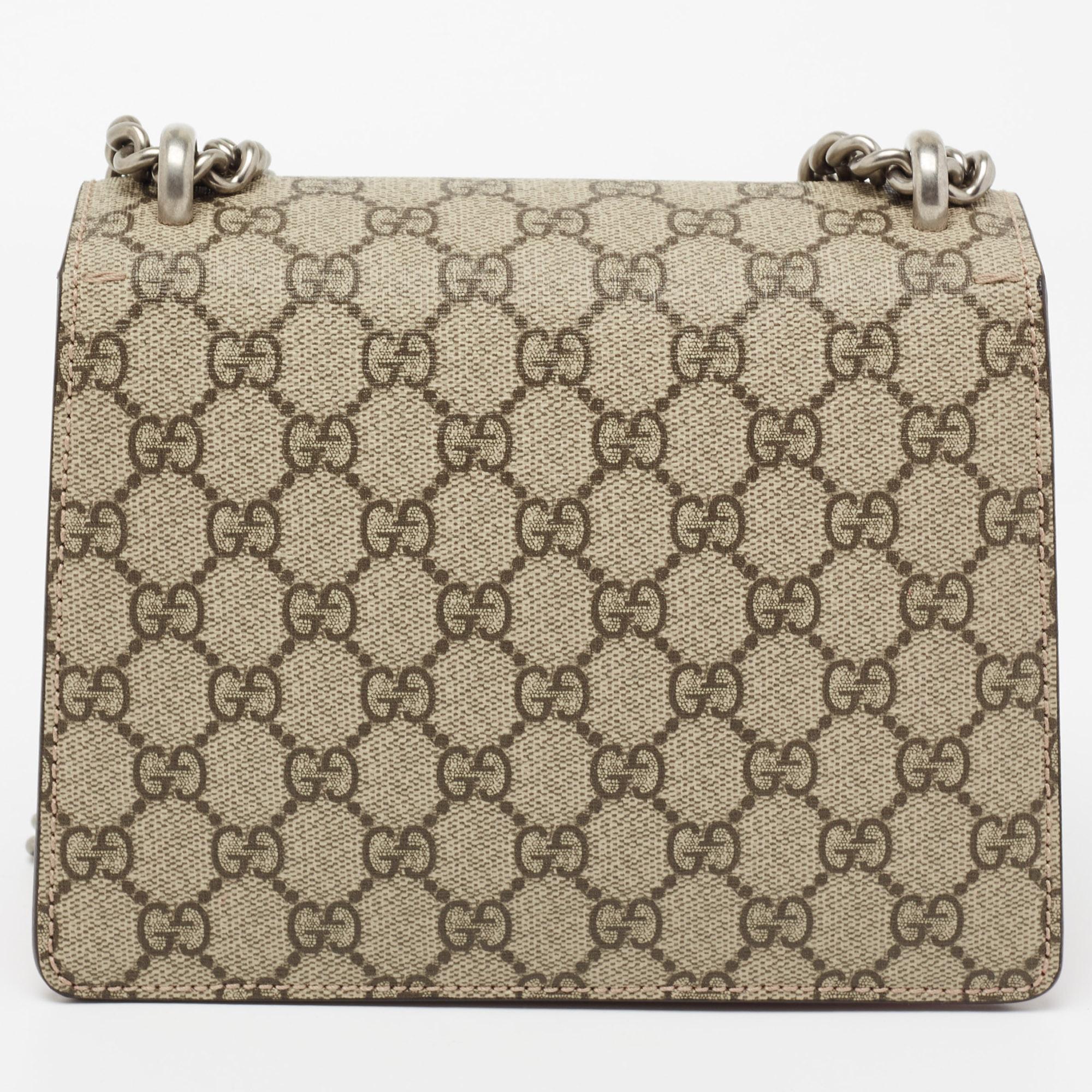 Gucci's Dionysus collection is inspired by the Greek God Dionysus, who is believed to have crossed the Tigris river on a tiger sent to him by Zeus. This creation has been beautifully made from GG coated canvas along with suede and beautifully merges