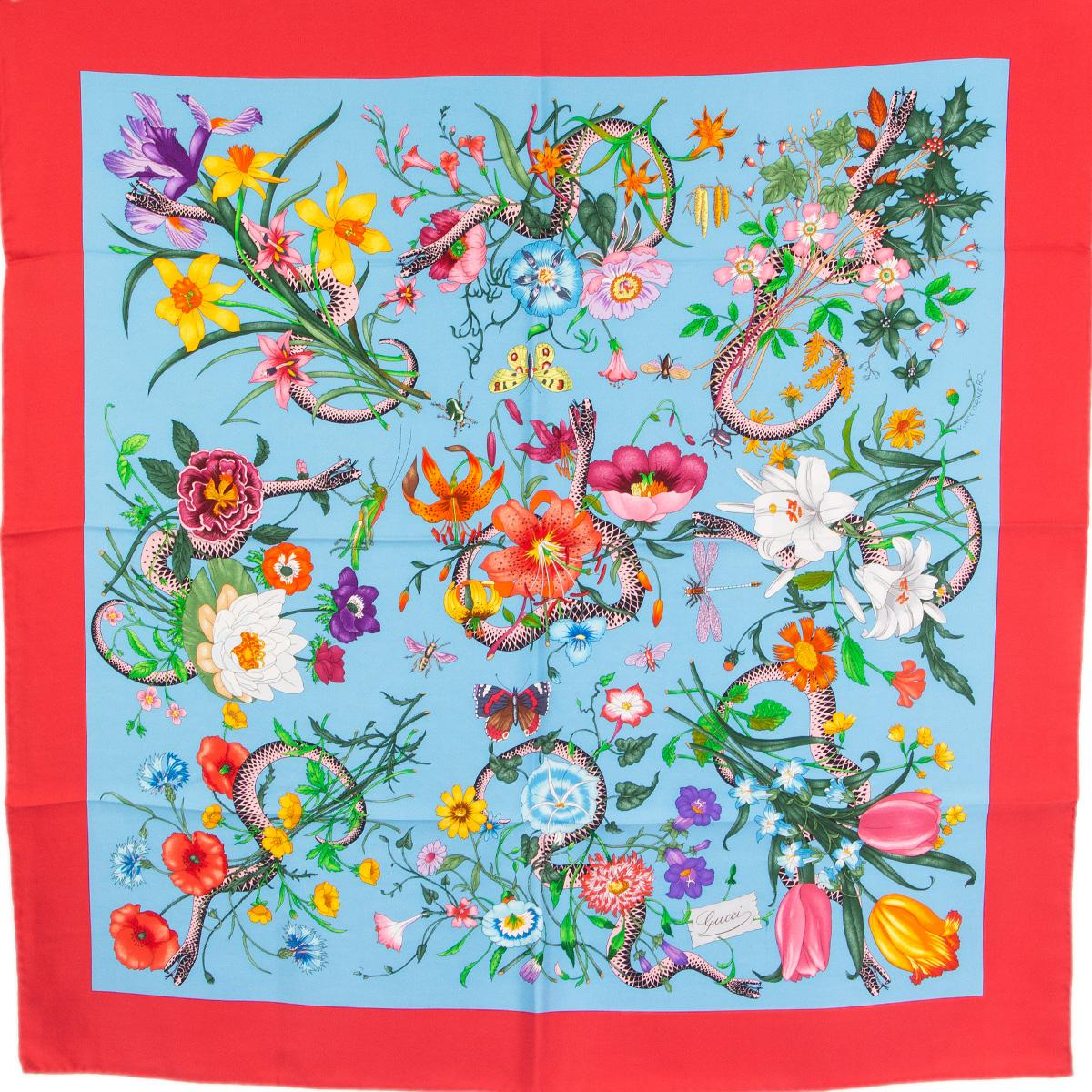 100% authentic  Gucci flora and snake printed scarf in pink and light blue silk (100%) featuring a stunning array of colorful flowers intertwined with coiling snakes-a symbol that has been established as one of Alessandro Michele's signature