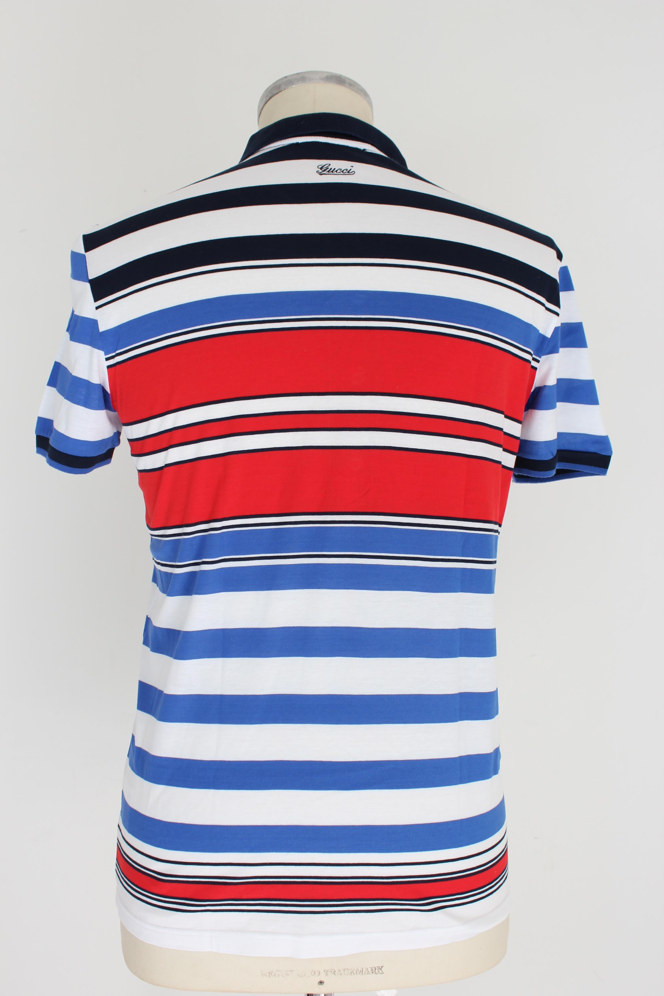 Gucci 2000s men's shirt. Short sleeved polo shirt, skinny model, striped. White, blue and red color, 100% cotton. Made in Italy. Excellent vintage condition.

Size: L / 48 It 38 Us 38 Uk

Shoulder: 48 cm
Bust / Chest: 50 cm
Sleeve: 18 cm
Length: 67