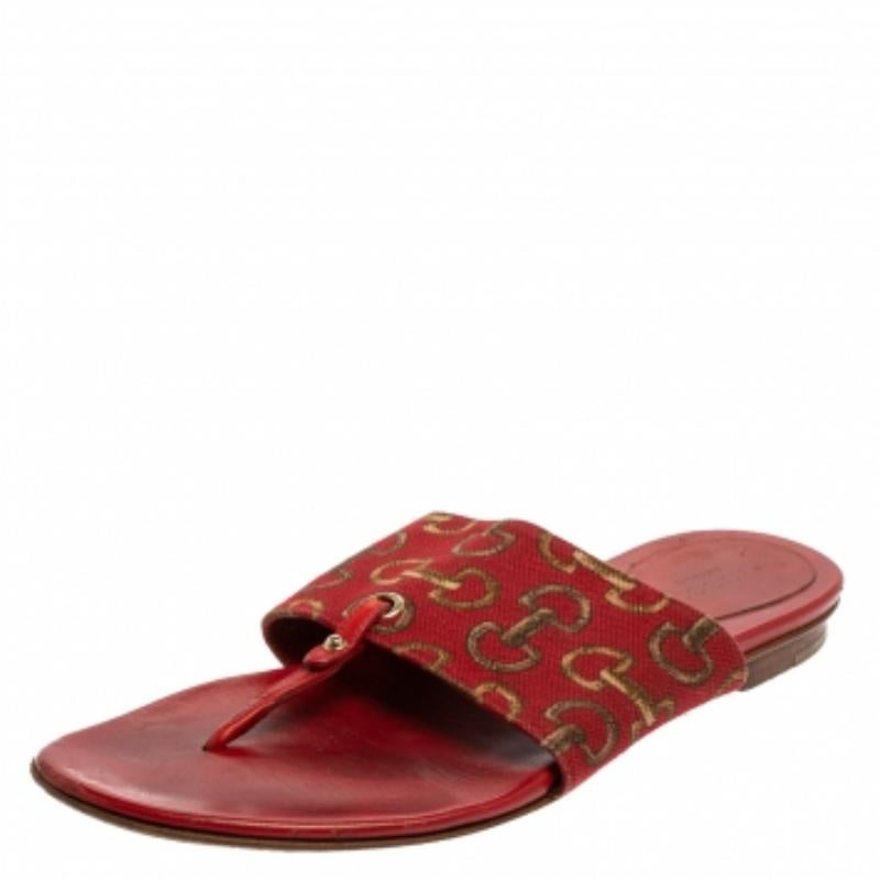 Simple, stylish, and comfortable, these Gucci sandals are a wardrobe must-have! Crafted from leather, they feature a canvas-made strap accented with Horsebit motifs for a signature feel. The thong sandals are made comfortable with leather-lined