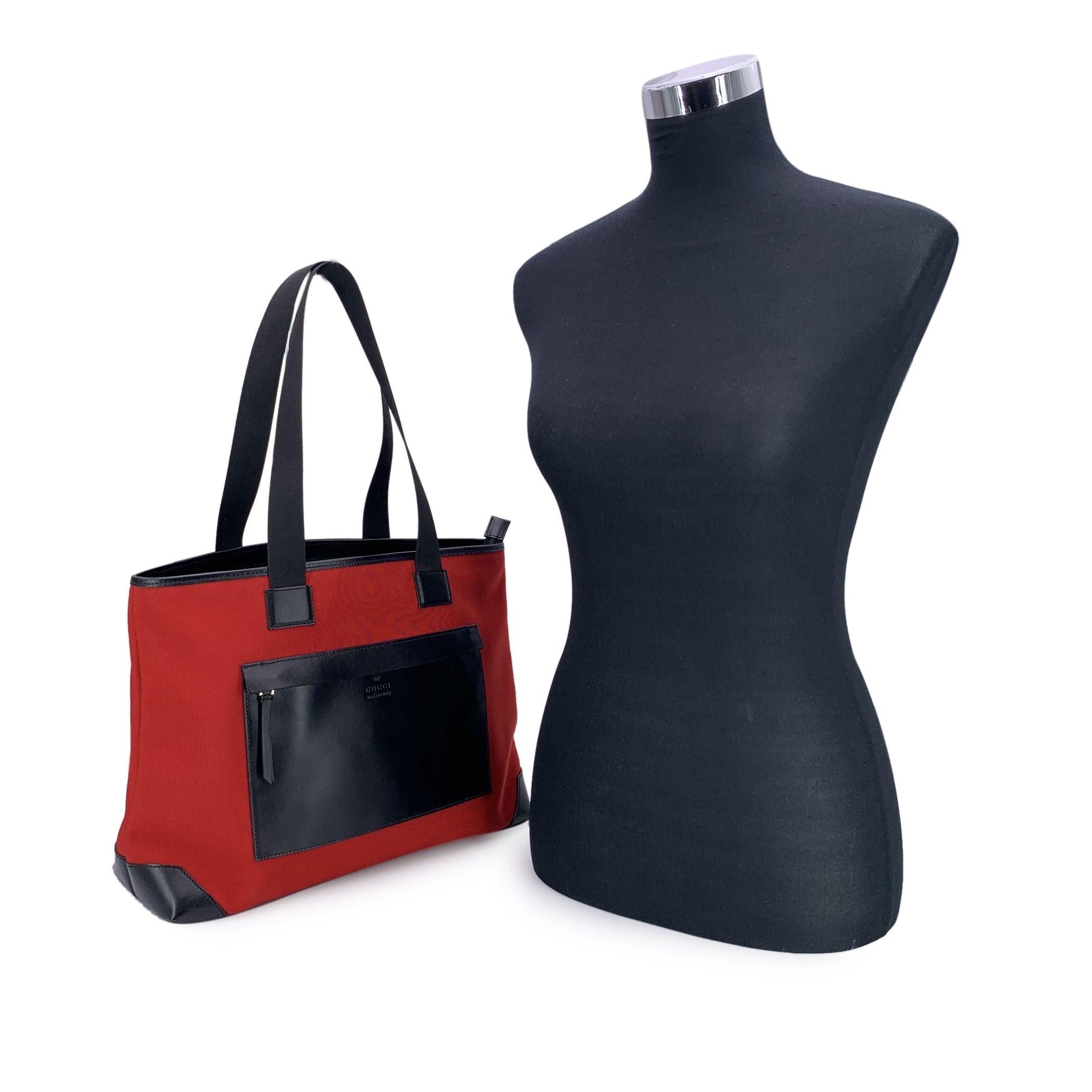 Gucci Red Nylon Tote - Bold, Sporty, and Unmistakably Italian A confident blend of practicality and bold design, this vintage Gucci tote captures the dynamic spirit of l early-2000s street-chic. Crafted in vibrant red nylon canvas, it's a striking
