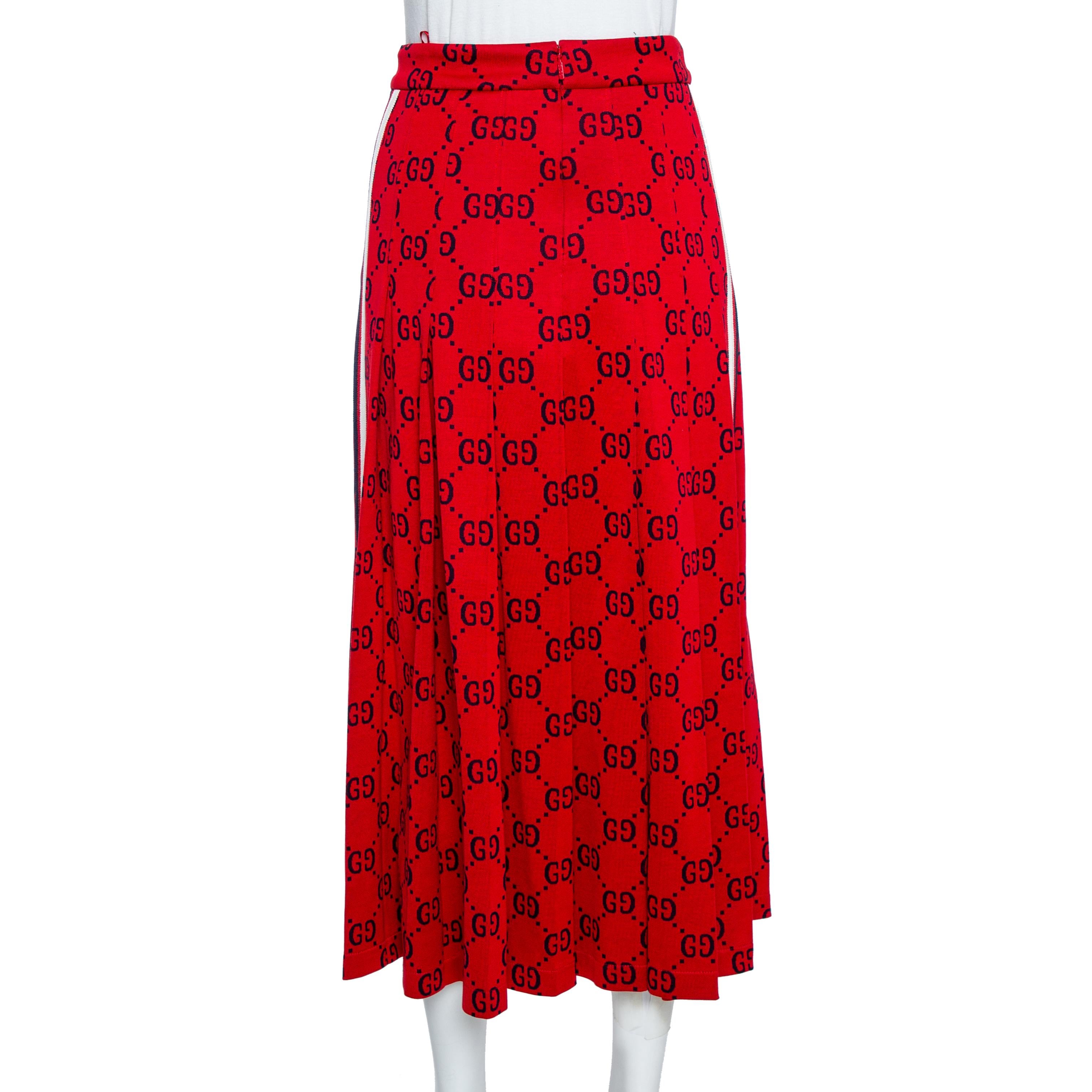 Gucci continues to incorporate original design elements into new collections. The emblematic monogram motif from the 1970s is presented on this skirt. The Sylvie Web stripe enhancing the sides is reminiscent of vintage tracksuits, and the creation