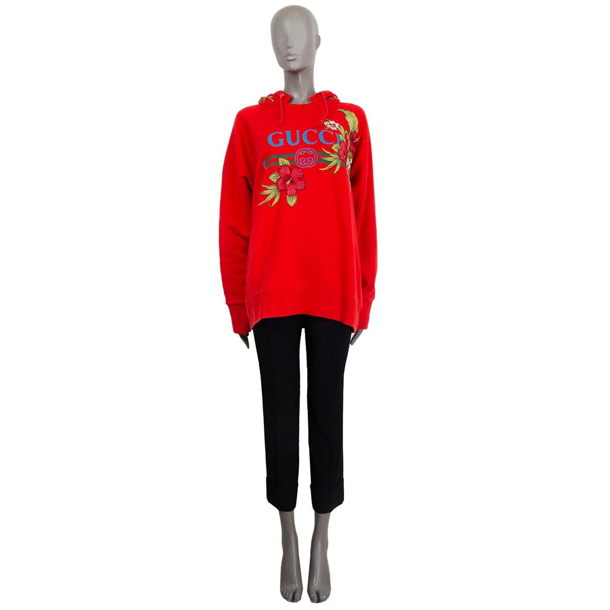 100% authentic Gucci oversized, distressed printed hoodie sweater in red cotton jersey (100%) with hibiscus flower embroidered at front and hood. Has been worn with a small stain on one cuff. Overall in excellent condition. 

Measurements
Tag Size	M