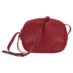 Gucci Red GG Embossed Microguccissima Calfskin Leather Mini Bree Messenger
