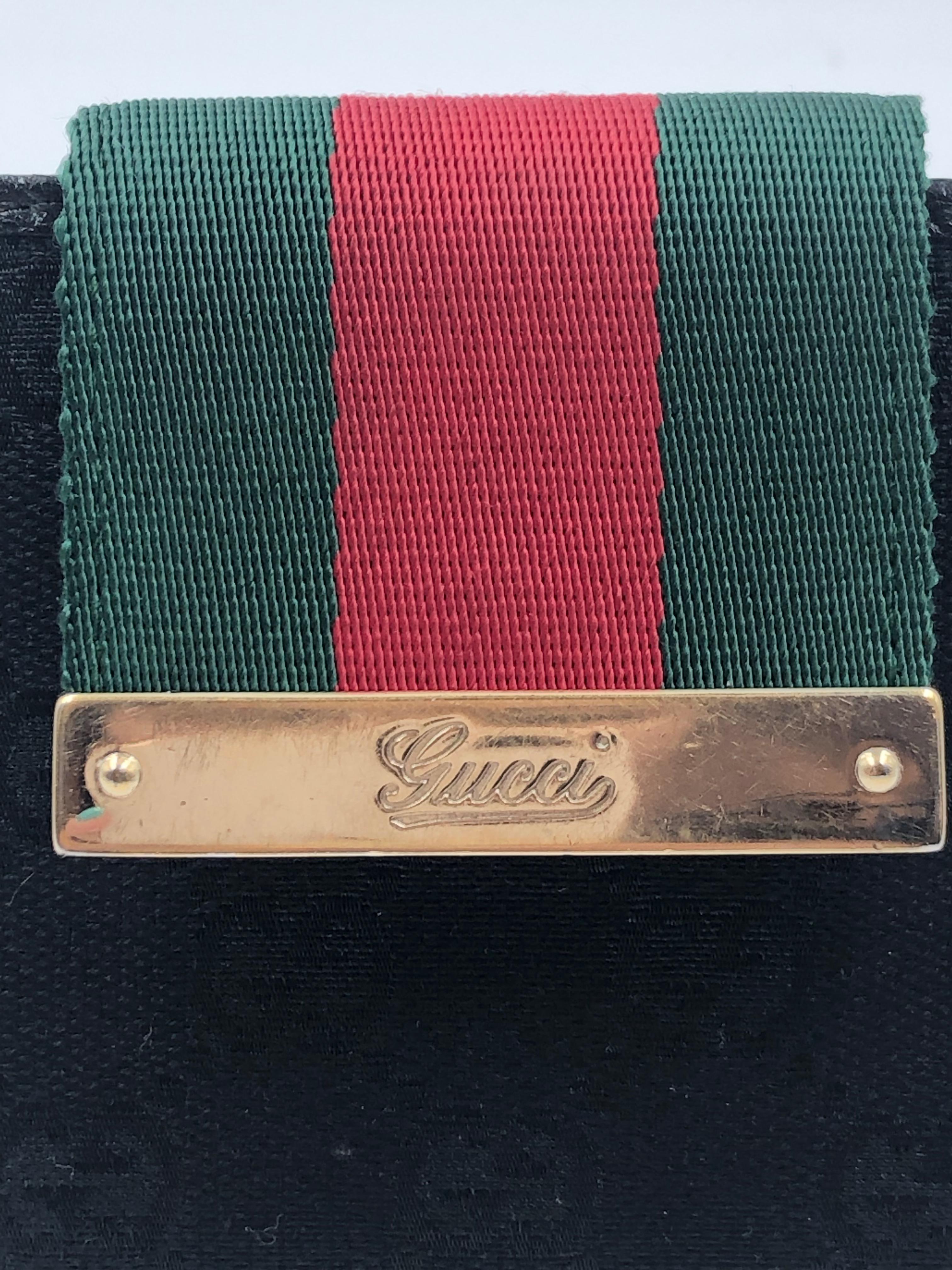 black gucci wallet with red and green stripe