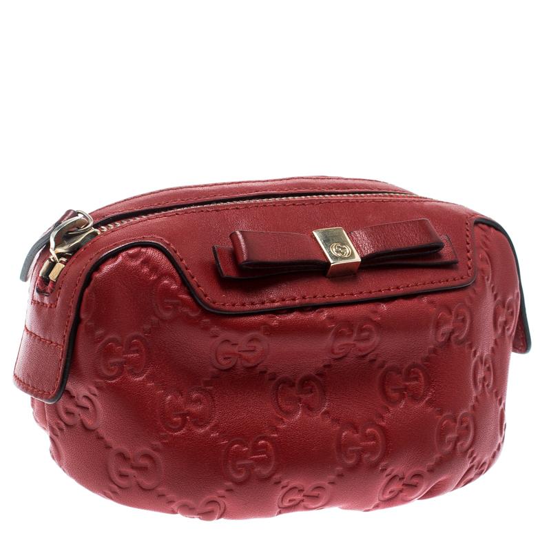 red leather makeup bag