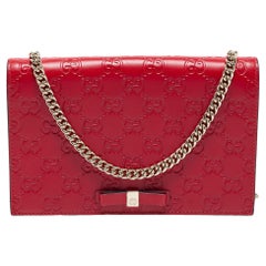 Guccissima Brieftasche aus rotem Guccissima-Leder mit Klappe an Kette
