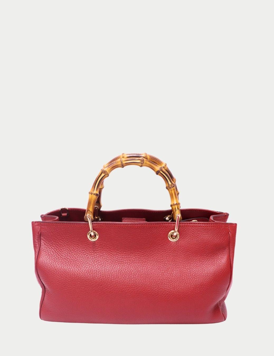 Gucci Red Leather Bamboo Handle Bag

An icon of timeless Italian luxury, this Gucci Red Leather Bamboo Handle Bag celebrates the brand’s heritage craftsmanship and elegant design.
Crafted in supple grained leather, the bag features Gucci’s signature