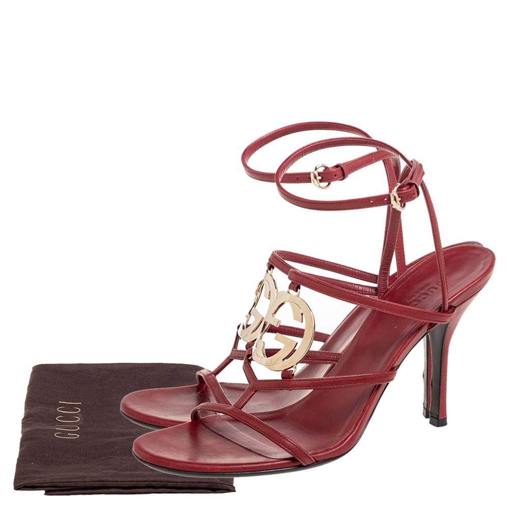 Complete your outfits with these beautiful Gucci sandals that are easy to wear and effortlessly stylish. Constructed in leather, red-hued sandals feature thin straps and the famous GG logo for a signature look. They are set on 10 cm heels.

