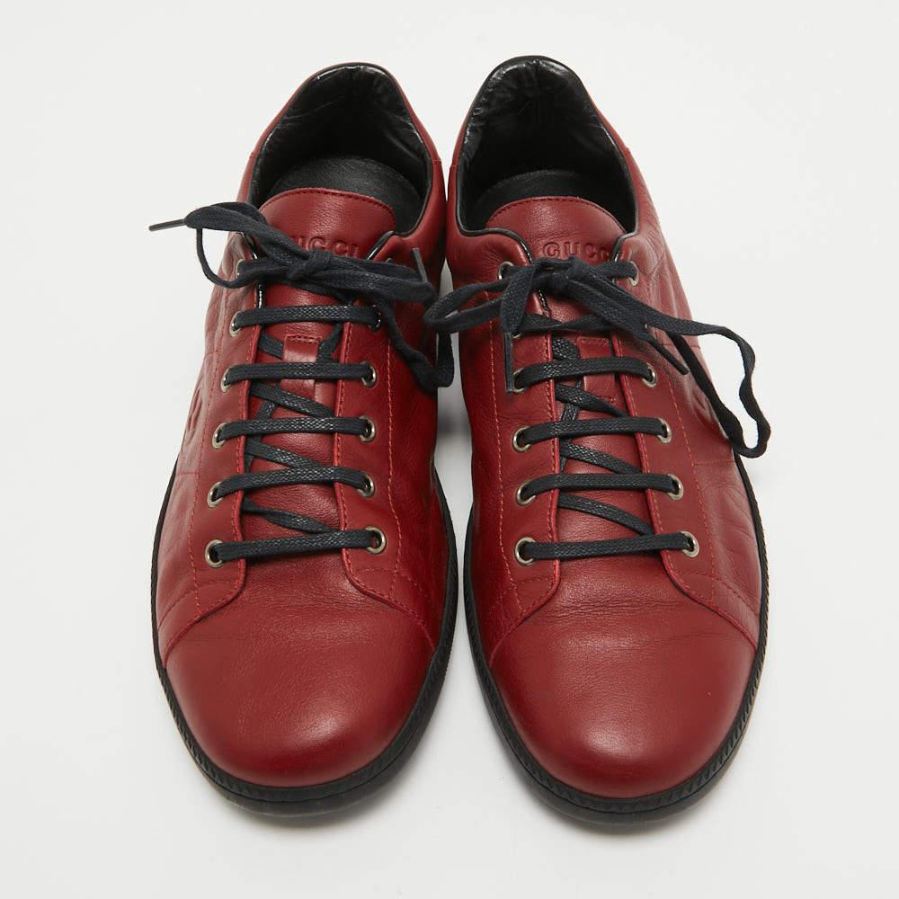 Step into fashion-forward luxury with these Gucci red sneakers. These premium kicks offer a harmonious blend of style and comfort, perfect for those who demand sophistication in every step.

