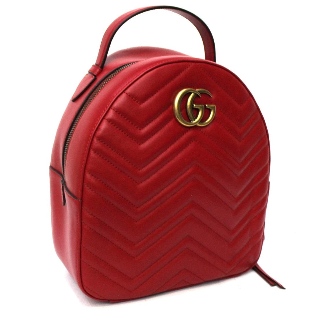 Gucci Marmont line backpack in red leather with golden hardware.

Zip closure, internally quite large.

Adjustable straps. IMPECCABLE CONDITIONS.