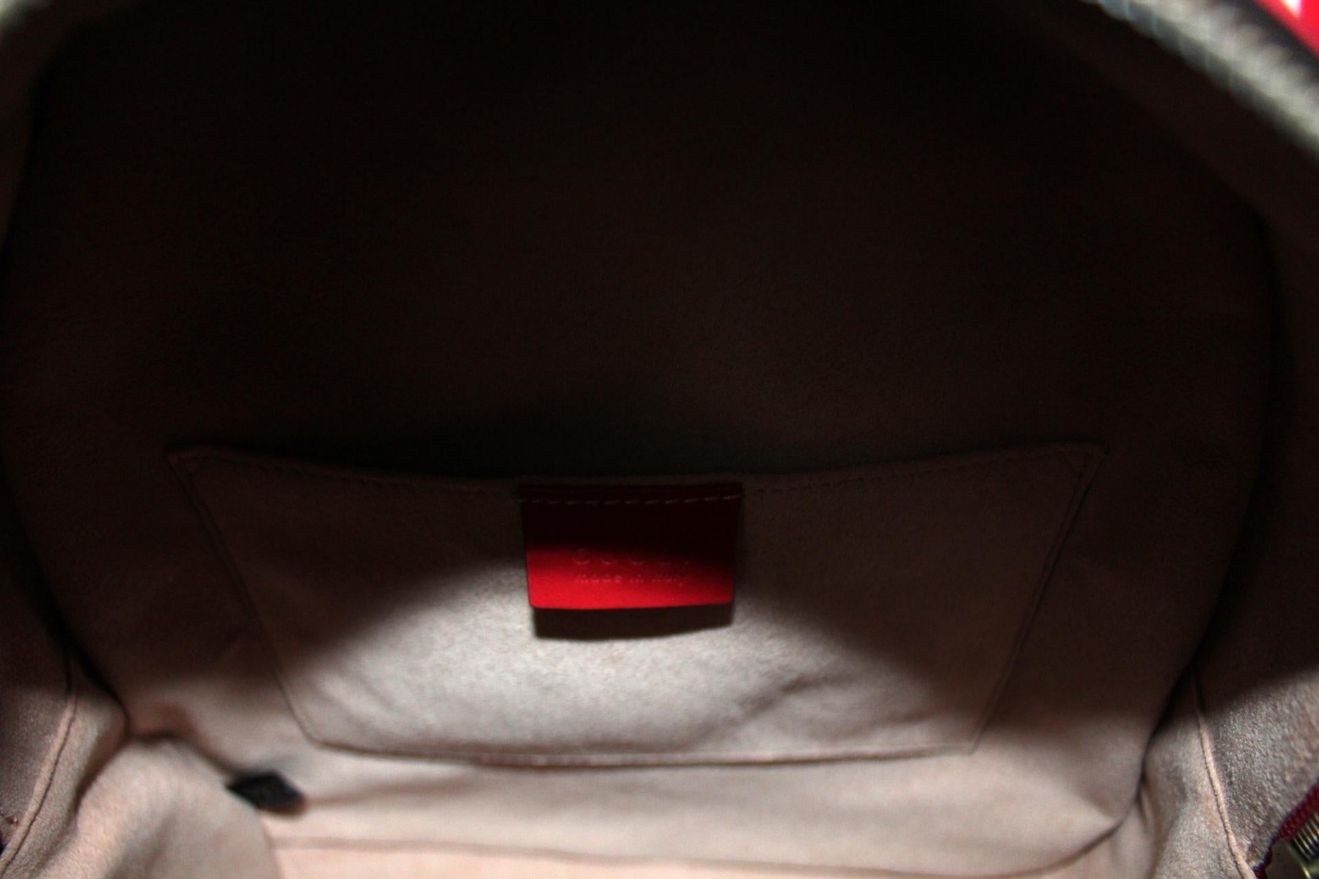 red gucci backpack
