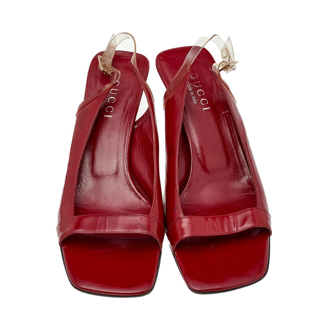 Flaunting a flattering silhouette and a well-made exterior, these sandals from Gucci are lovelier than ever. These sandals are made with red leather on the upper and feature open-toes and buckled slingbacks. Spruce up your attire by wearing these