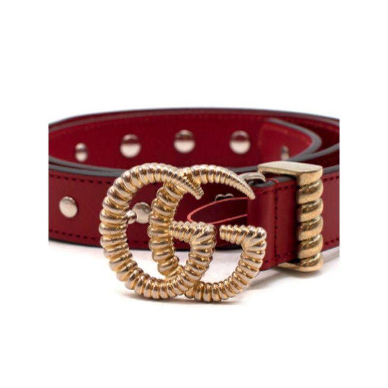 Gucci Red Leather Studded Belt - Size 80

-Gold tone hardware 
-Studded details on body 
-Adjustable pin fastening 
-GG plaque detail 

Material: 

Leather 

Made in Italy 

PLEASE NOTE, THESE ITEMS ARE PRE-OWNED AND MAY SHOW SIGNS OF BEING STORED