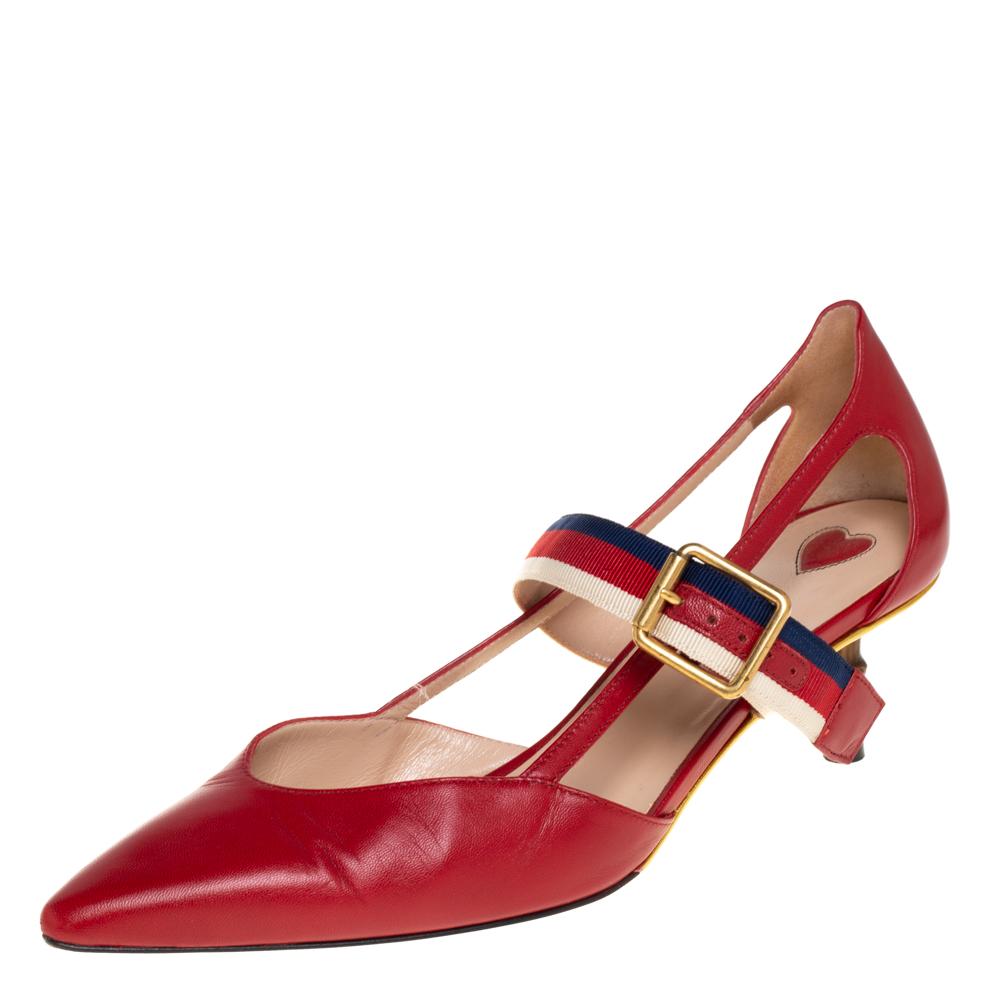 These pointed-toe pumps from Gucci have come straight from a shoe lover's dream. Crafted from red leather, detailed with web straps, and balanced on 5.5 cm bamboo heels, the pumps are lovely and gorgeous!

Includes: Original Dustbag
