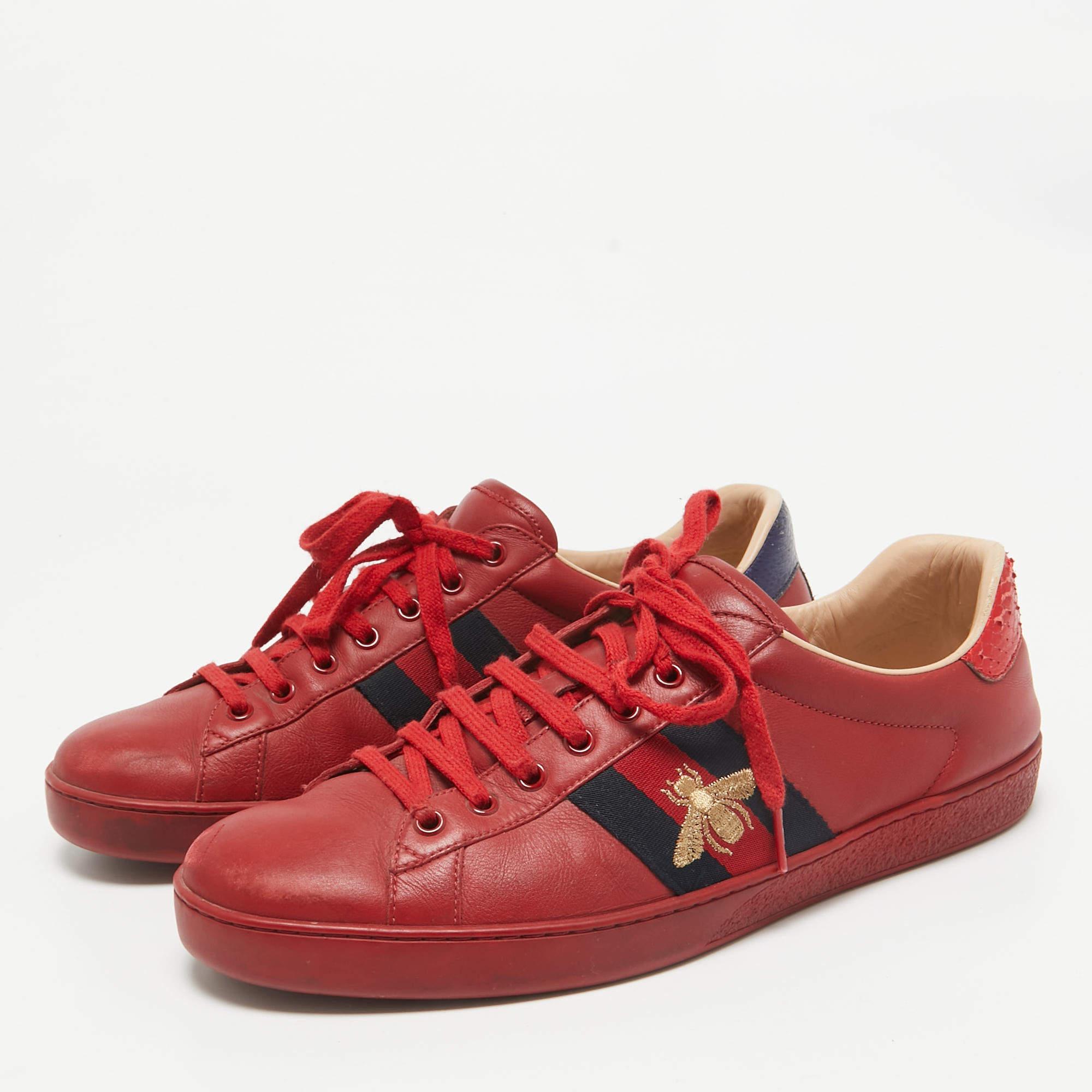 Add a statement appeal to your outfit with these red Gucci Ace sneakers. Made from premium materials  they feature lace up vamps and relaxing footbeds. The durable sole of this pair aims to provide you with everyday ease.