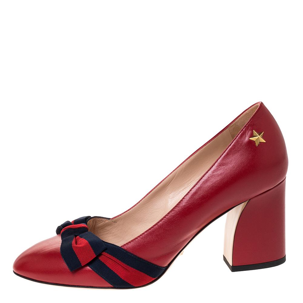 Gucci has always been known to churn out uniquely designed creations just like this pair of pumps. Add a splash of elegant charm to your ensemble with this red pair. They are rendered in leather and feature round toes with signature Web bow accents