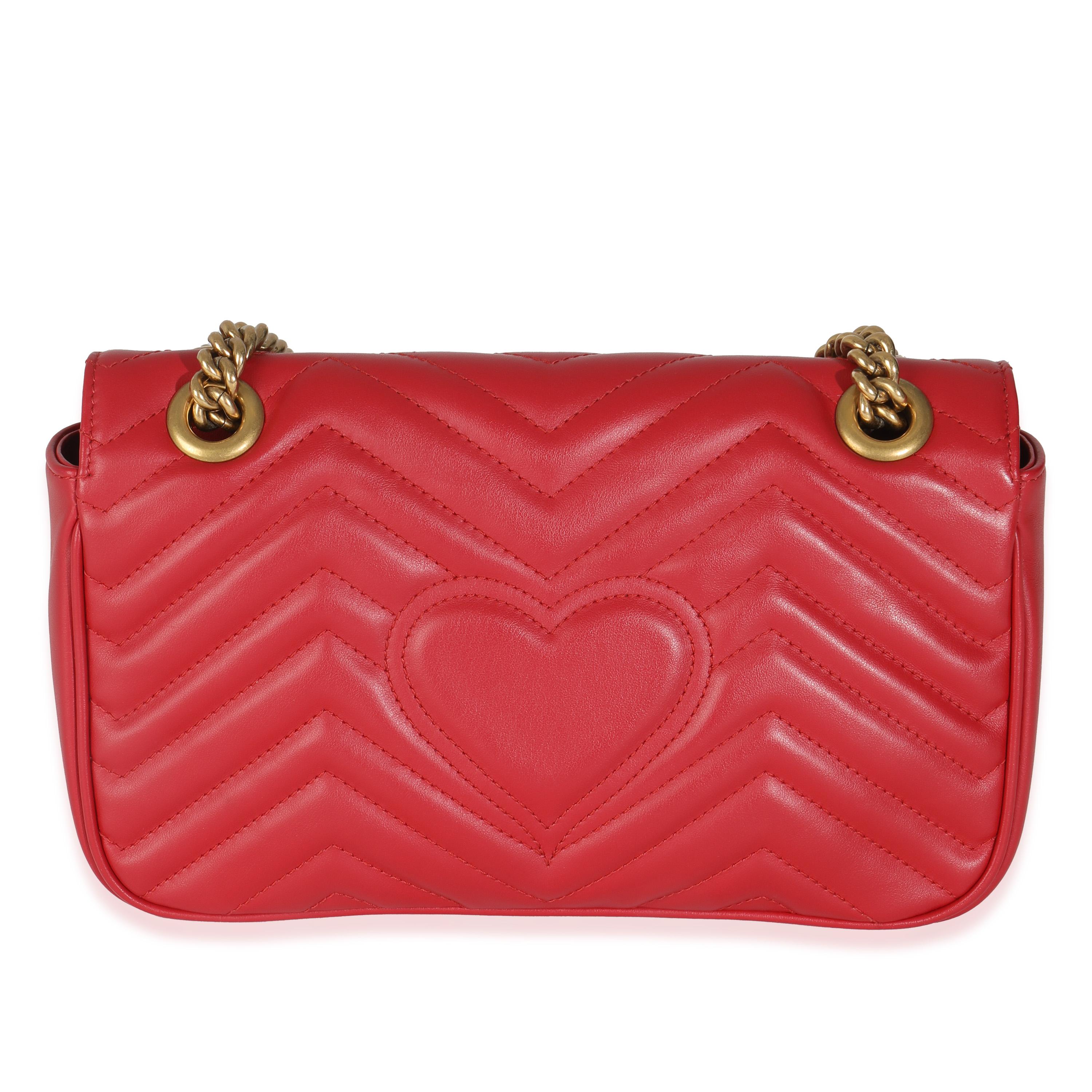 Listing Title: Gucci Red Matelasse Calfskin Small GG Marmont Flap Bag
SKU: 145249
Condition: Pre-owned 
Condition Description: The Marmont edit from Gucci is an extension of the House's signature GG belt from the '70s. With a matelassé finish, this