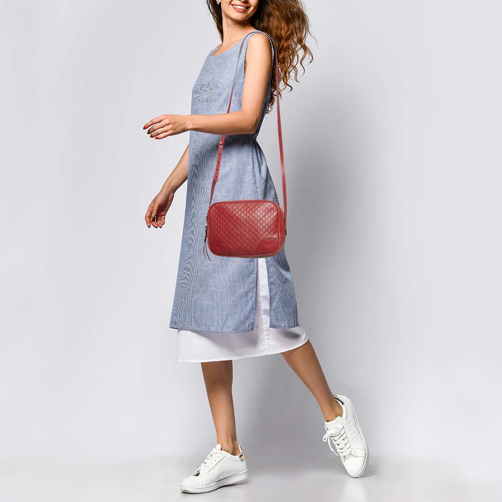 Carry everything you need in style thanks to this Gucci red crossbody bag. Crafted from Microguccissima leather  this is an accessory that promises enduring style and usage.