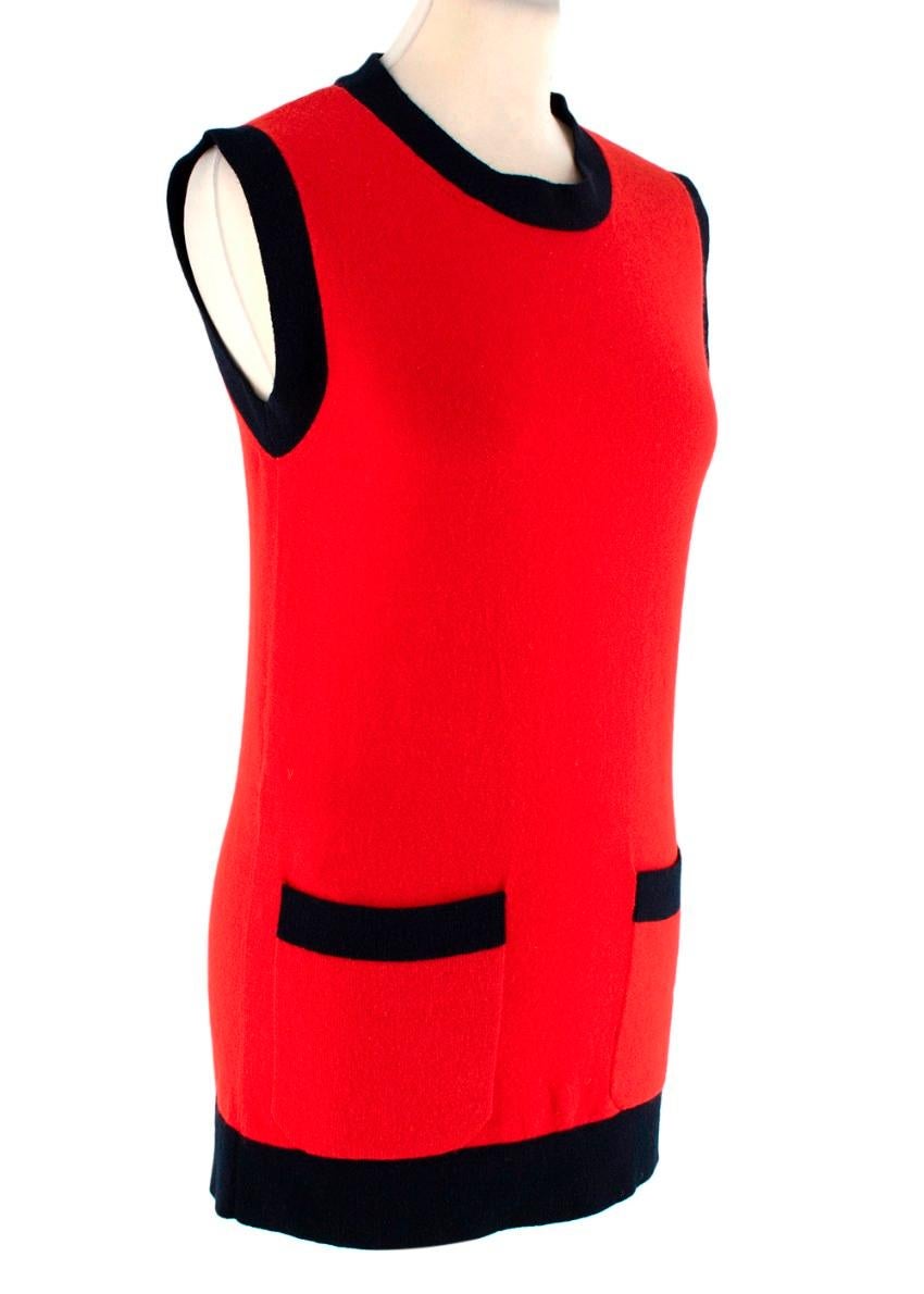  Gucci Red & Navy Knitted Wool & Cashmere Sleeveless Top 
 

 - Knitted sleeveless red top with ribbed dark navy edges
 - Round neckline
 - Two front patch pockets with a matching edges
 

 Materials:
 70% Wool
 30% Cashmere
 

 Made in Italy
 Dry