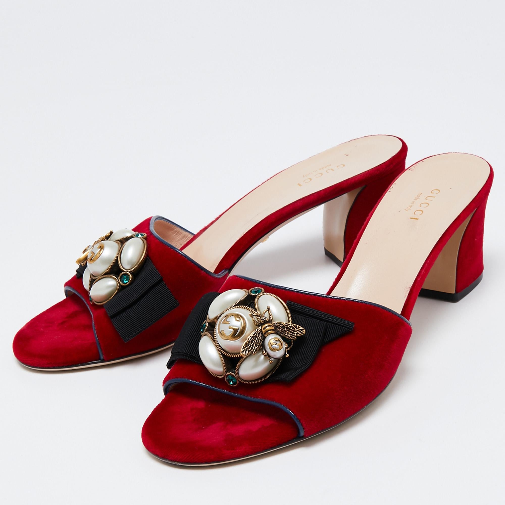 You can count on these sandals from Gucci for an elevated feel. They are crafted from suede as well as leather and designed with open toes, embellishments on the uppers, and short block heels.

Includes: Original Dustbag