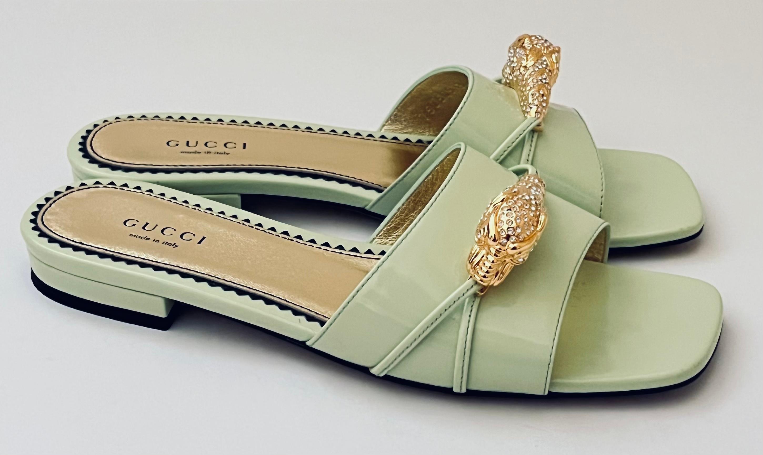 Retro glam Gucci Regent crystal panther head slides sandals. Worn once - come with box, dustbags and pamphlets. Made from pistachio green patent leather with crystal set goldtone panther head decoration. They have gold padded leather insoles and