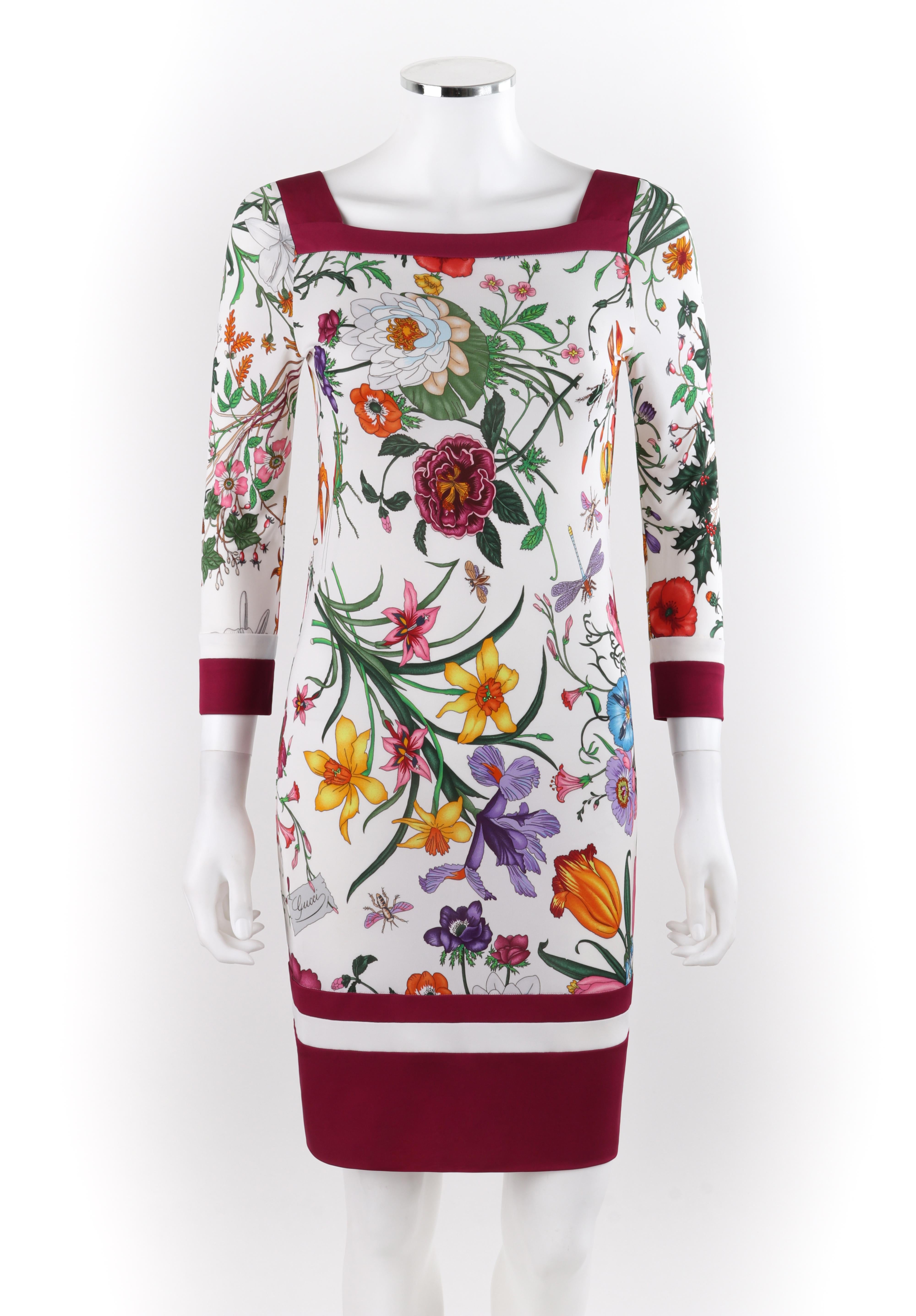 GUCCI Resort 2013 FRIDA GIANNINI Square Neck 3/4 Sleeve Floral Print Sun Dress
 
Brand / Manufacturer: Gucci
Collection: Resort 2013 
Style: Shift dress
Color(s): Multicolor on white background
Lined: No
Marked Fabric Content: 100% rayon
Additional