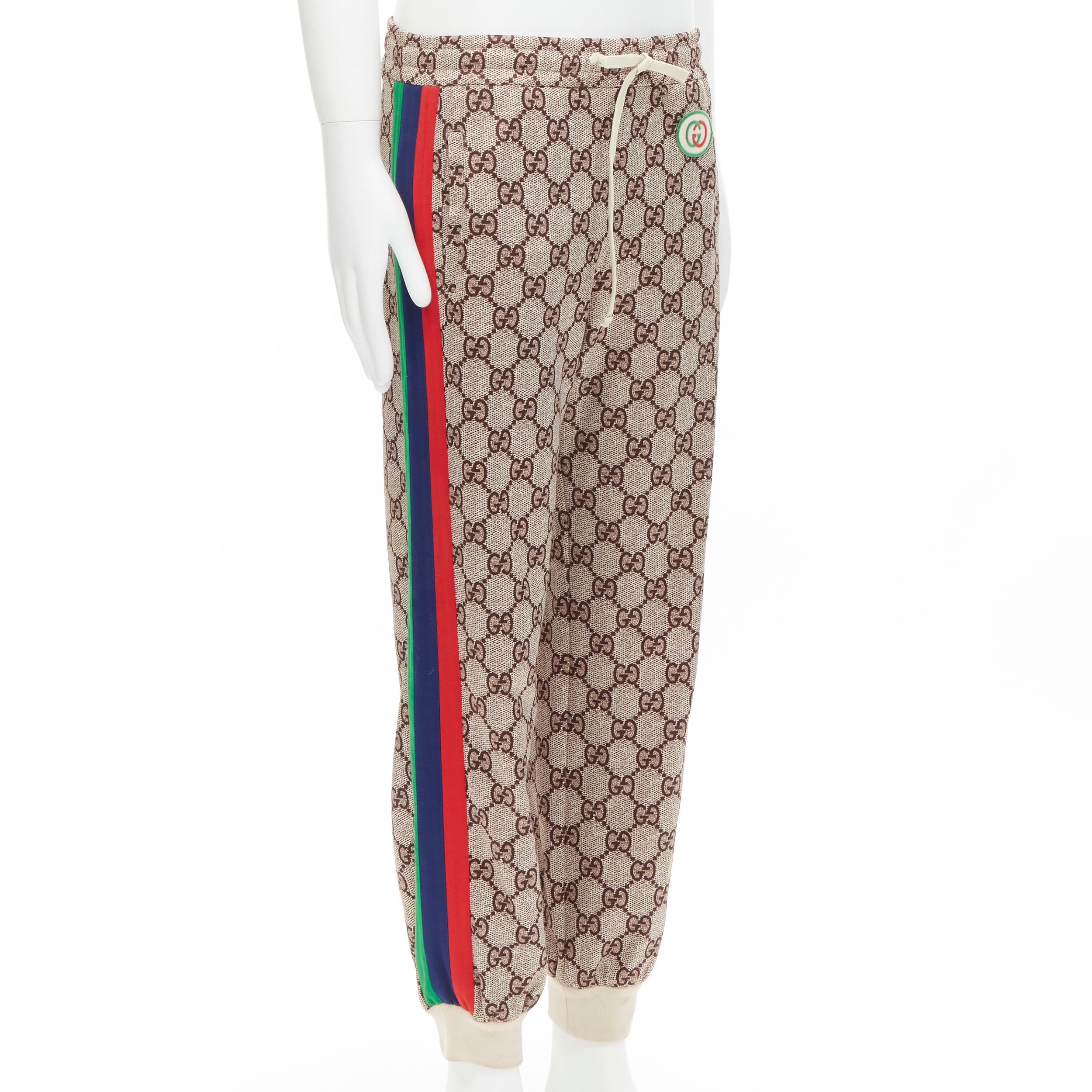 GUCCI Retro Rainbow GG Supreme vintage monogram web track sweat pants S
Brand: Gucci
Collection: Retro Rainbow 
Extra Detail: GG logo patch at front waist. Web trim along side. Drawstring waist.

CONDITION:
Condition: Excellent, this item was