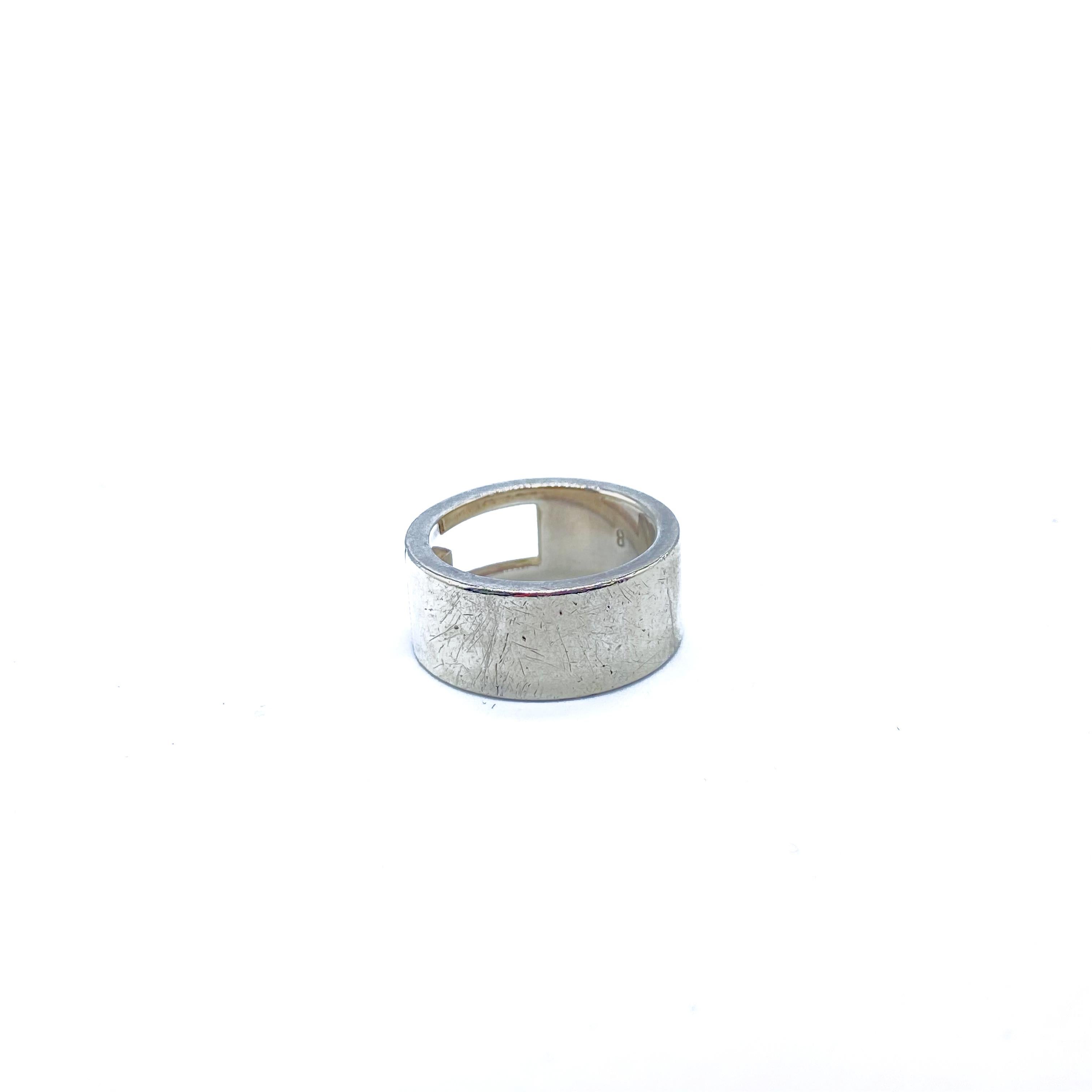 Gucci Vintage 1990s Sterling Silver Ring

Timelessly cool ring from Gucci

Detail
-Made in Italy in the 1990s
-Crafted from sterling silver
-Features a cut out G for G logo

Size & Fit
-Ring size 4.5
-Width - 0.5 inches
-Weight - 7g

Authenticity &