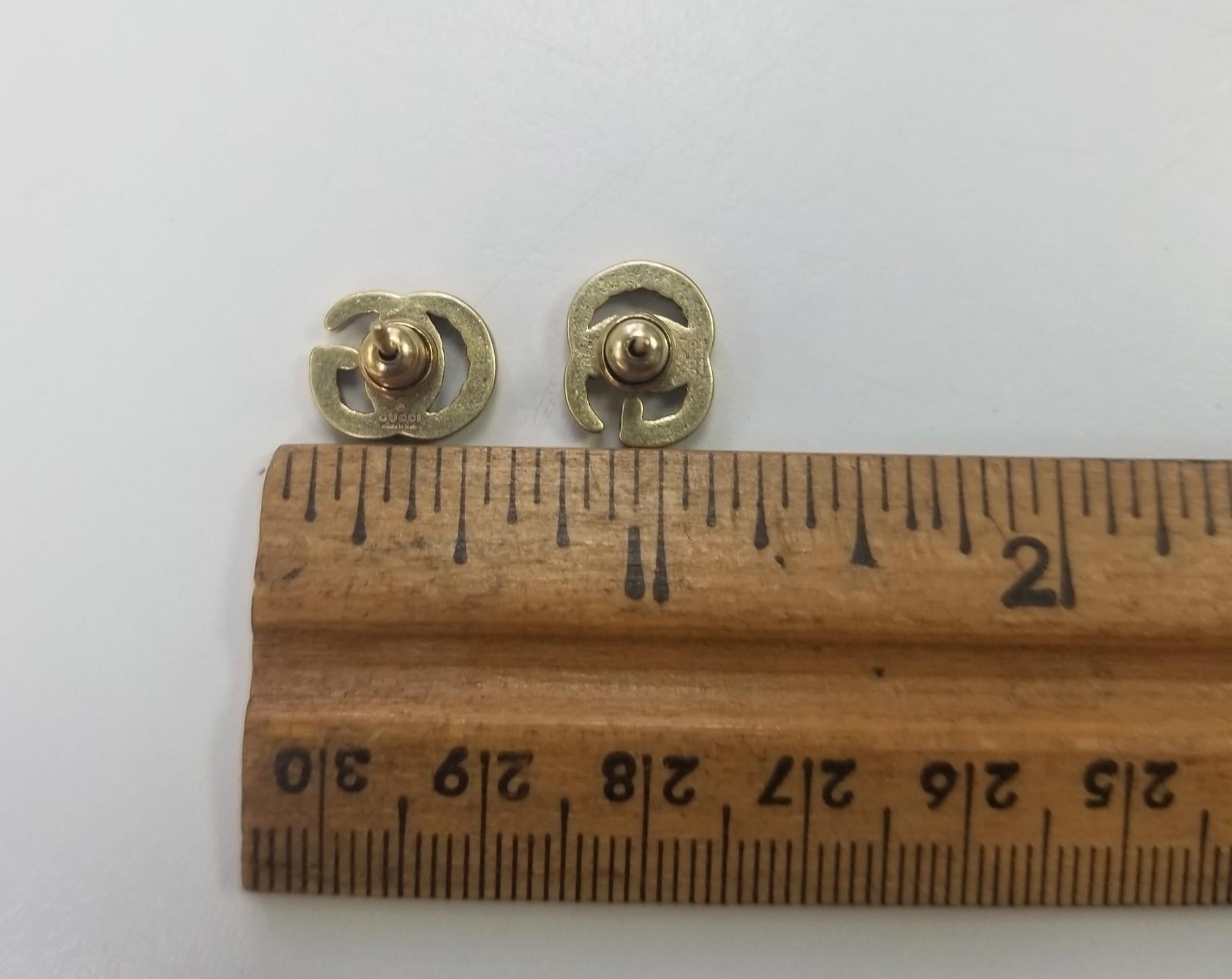 gucci logo earrings gold