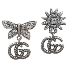 Gucci, boucles d'oreilles en corde avec logo « GG » et papillons pendants SS.925