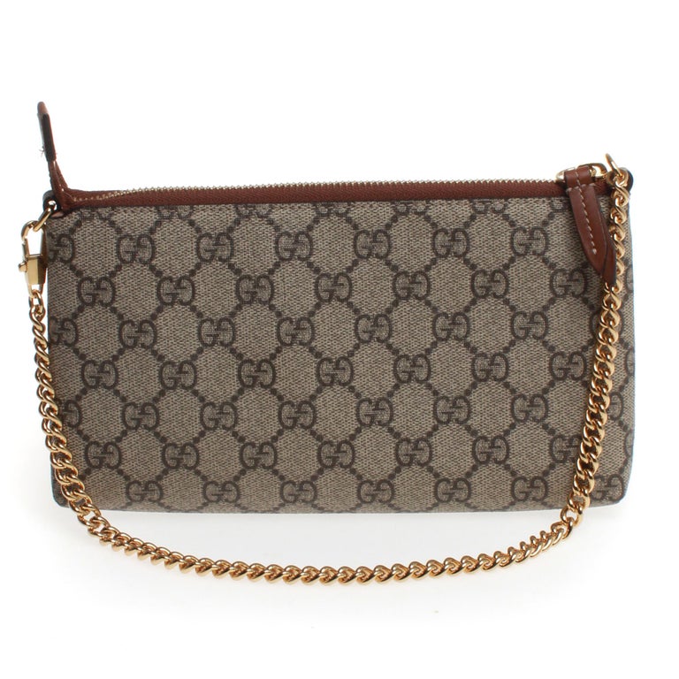 Gucci Rose Clutch Bag with GG monogram print and gold chain strap at 1stdibs
