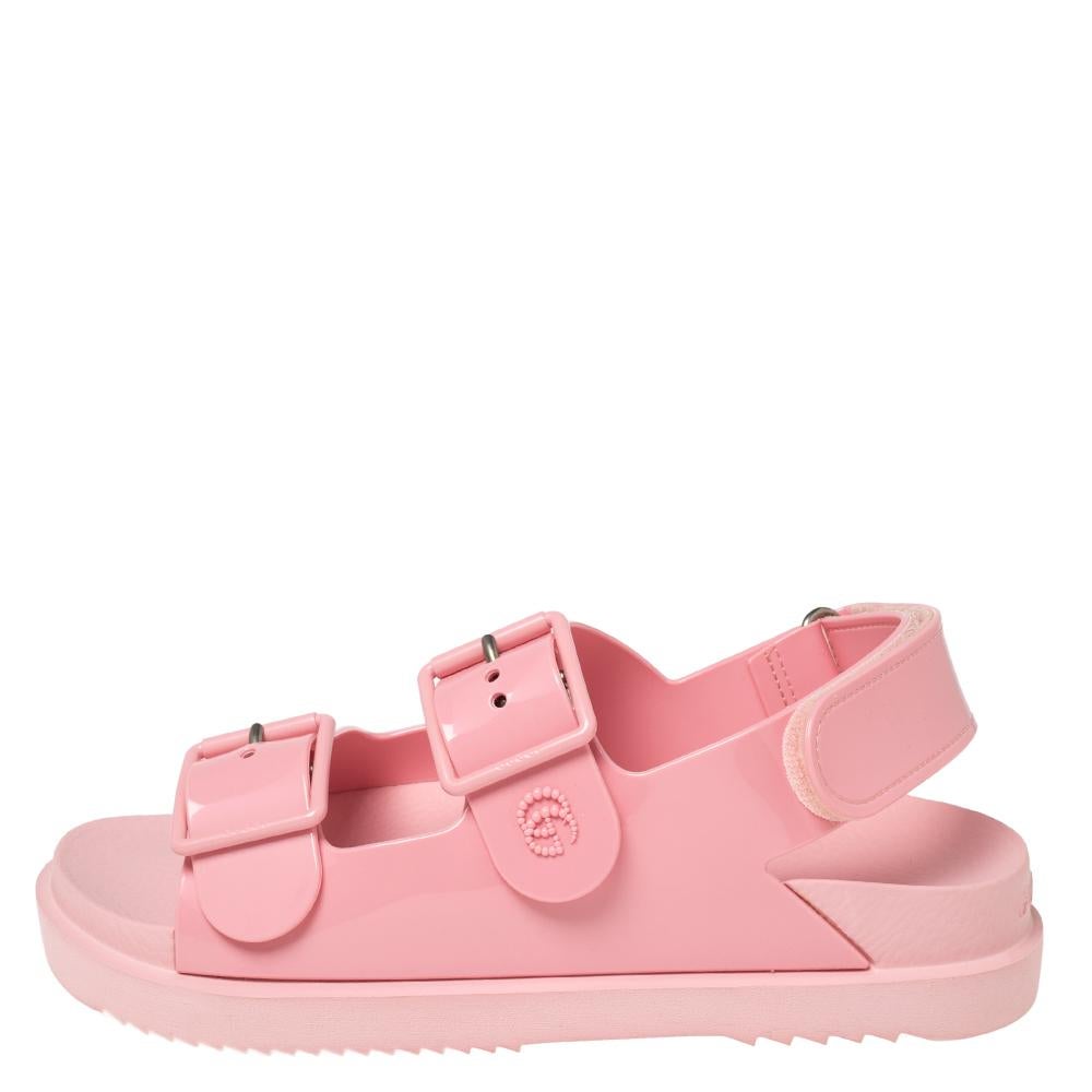 Elevate effortless looks this season with these sandals from Gucci. They're made of rubber and styled with dual-buckle uppers, velcro back strap closure, and rubber soles.

Includes: Original Box, Original Dustbag, Info Booklet