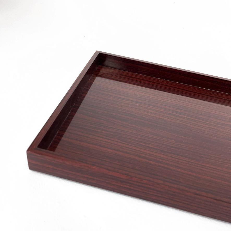 Stunning and fantastic rare vintage Italian hallmarked Gucci tray is sleek made of rosewood. It is fantastic for serving for barware or for dining. I have never seen another one like this. In very great vintage condition; this is a beauty and a