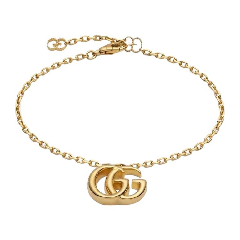 Gucci Running G 18 Karat Yellow Gold Bracelet with Double G Charm  YBA501676001 For Sale at 1stDibs | gucci gold bracelet, gucci bracelet gold