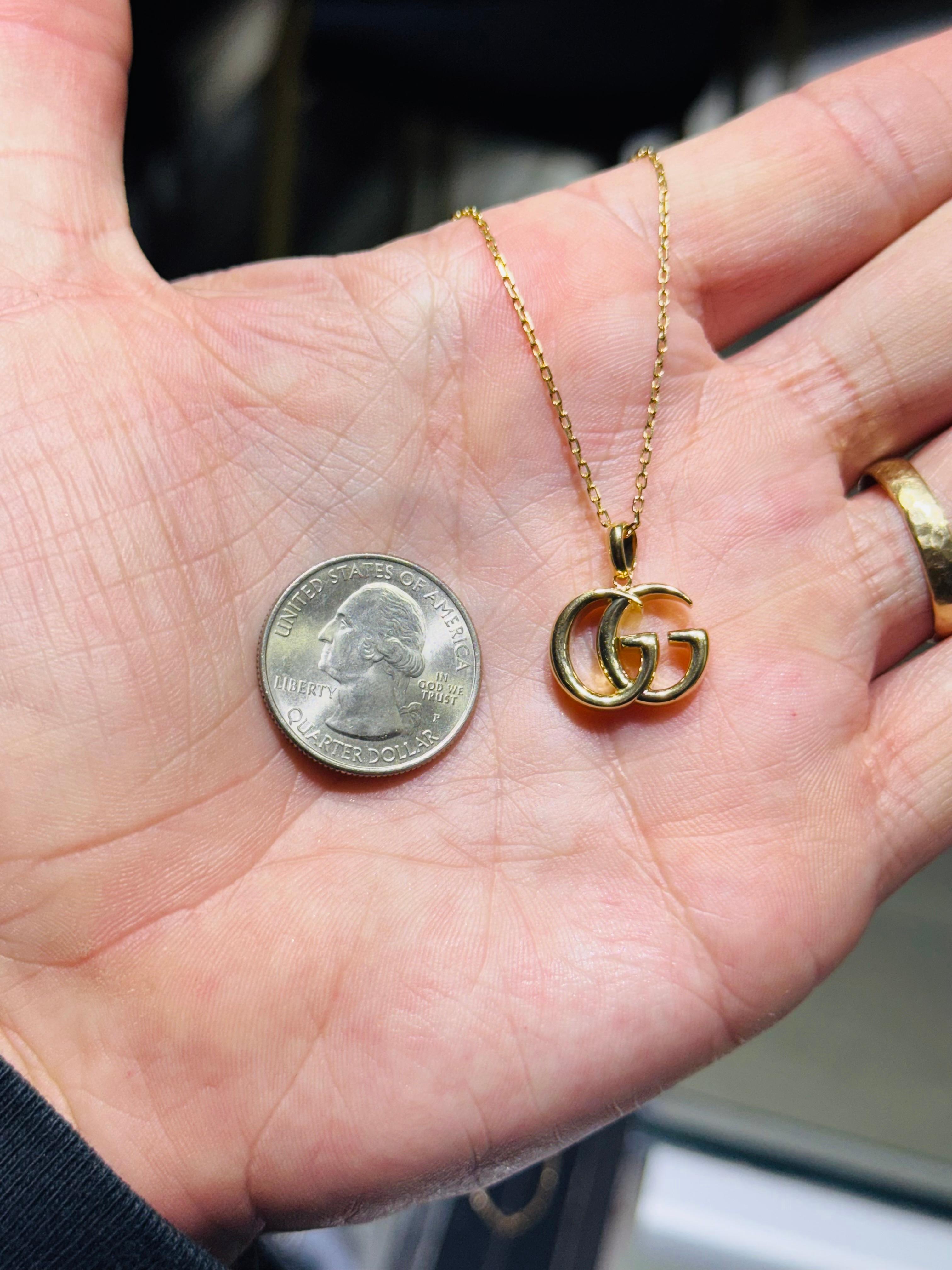 Gucci, collier pendentif Running GG en or jaune 18 carats en vente 3