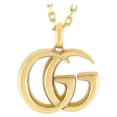 Gucci "Running GG" 18 Karat Yellow Gold Pendant Necklace