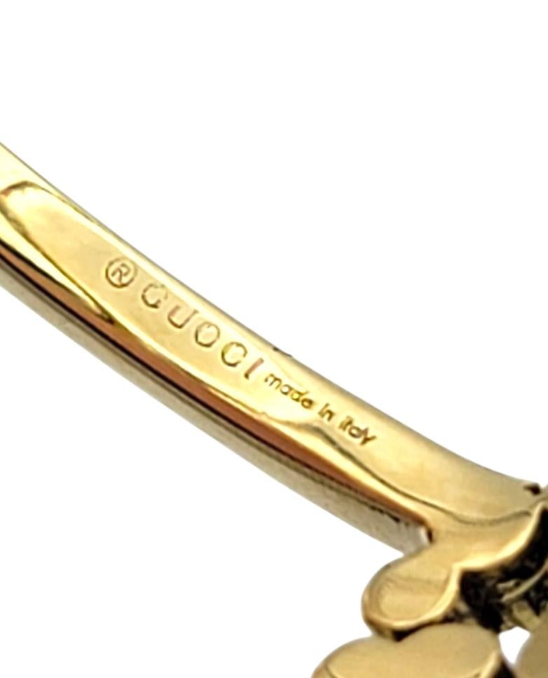 Anello a fascia con diamanti incrociati GG di Gucci in oro giallo 18 carati lucido in vendita 3